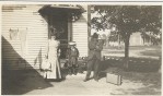 Manchester NH - 3 unidentified people standing outside 983 Cilley Road, circa 1900-1920. Nice hats!