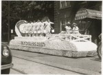 Manchestester NH - parade with Milk Dealers float and lovely girls circa 1940.